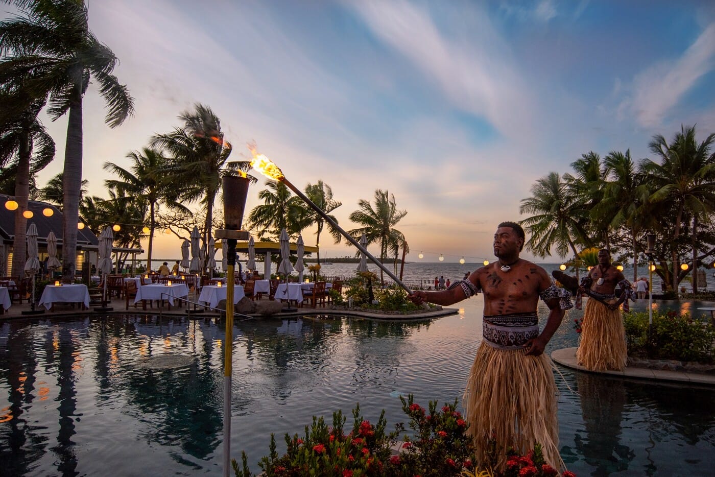 Sofitel Fiji Resort & Spa - A Fijian warrior sets the scene at Waitui Beach Club